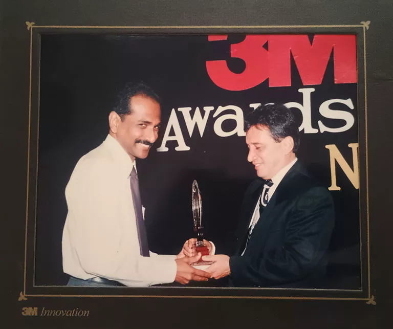 Recieving award from Carlos A. Torres